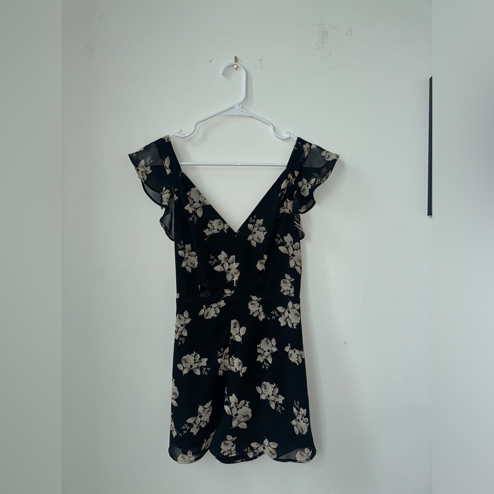 Reversible black floral romper